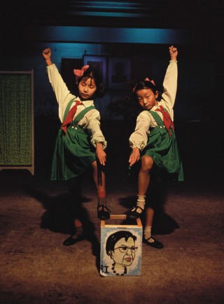 Two young school children in a school in Shanghai perform a skit denouncing Madam Mao, Jiang Qing, after the arrest of the Gang of Four, 1977. The so-called Gang of Four for which Madam Mao was allegedly the leader represented the ultra leftist ideologues in the Chinese Communist Party. Photo (c) Liu Heung Shing