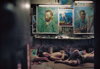 In Shenzhen, on the border with Hong Kong, workers at a painting factory are trained to reproduce masterworks by artists such as van Gogh for export. Photo (c) Yu Haibo, 2005
