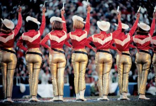 NFL Championship, Packers 34, Cowboys 27, Cotton Bowl, Dallas, January 1, 1967: Dallas Cowboys cheerleaders strike a pose in support of their team, making its first appearance in a championship game. Photo: Neil Leifer