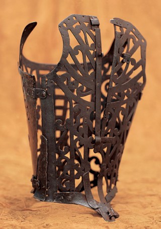 Fashion History Corset, c. 1580-1600, French. Iron with scroll motif; one front and two back pieces; opening at center-back. Inv. AC9250 95-45. Gift of Wacoal Corp.