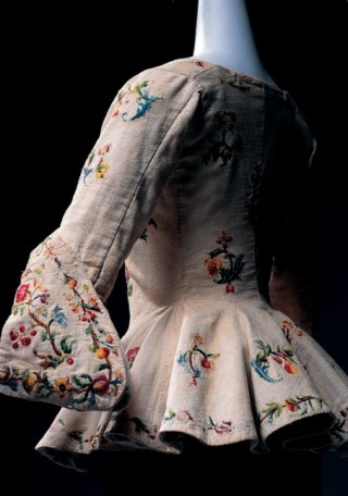 Casaquin, Late 17th Century, Italian. White cotton/linen with polychrome wool embroidery; floral motif; sabot sleeves; with peplum. Inv. AC9176 94-40-3AB