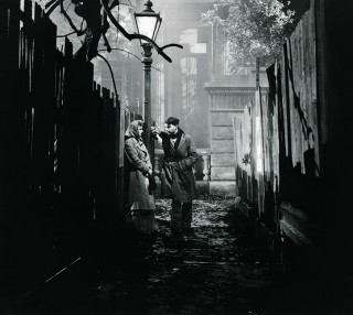 Film Noir <strong>Still from 'They Drive by Night' (1938)</strong><br /> When Shorty Matthews (Emlyn Williams) Gets out of jail and finds his girlfriend murdered, only Molly O'Neill (Anna Konstam) believes he is innocent. The atmosphere echoes the French poetic realist films.