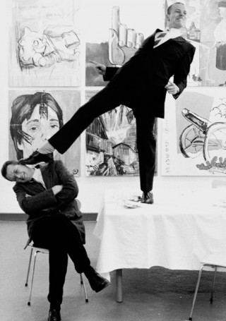 With Max Hetzler after an opening of Reinhard Mucha in front of the painting <em>8 pictures to think about whether we can keep this up</em>, Max Hetzler Gallery, Cologne, 1983. Foto : Wilhelm Sch&uuml;rmann
