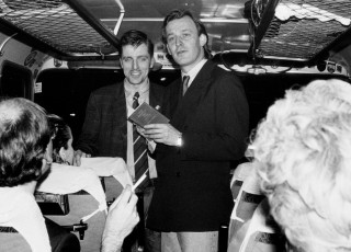 Martin Kippenberger and Albert Oehlen in a bus after the opening of the show, <em>Easily the applause vanishes</em>, reading from their book <em>Poetry</em>, Gallery Gr&auml;sslin-Erhardt, Frankfurt am Main, 1987