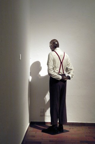 Kippenberger Martin Kippenberger, Martin, into the corner with you and shame on you, 1989. Wood figure, plexiglass head, clothing, 69 x 31 1/2 x 15 3/4 inches. (c) <span class="td">Estate of Martin Kippenberger</span>