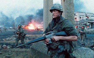 Still from 'Full Metal Jacket' (1987). Private Joker (Matthew Modine) on patrol in "a world of shit."