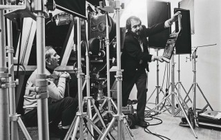 Kubrick with clapboard on the set of <em>A Clockwork Orange</em>