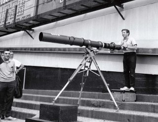 Leifer on assignment, Comiskey Park. Young Neil shoots from the bleachers using a 2,000 mm lens owned by Life magazine. Photo (c) Neil Leifer
