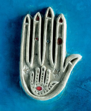 Frans Ankone. Marrakech. A "Hand of Fatima" (the daughter of the Prophet Mohammed) on the wall of the hall.
