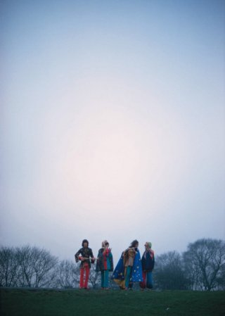 <font size="1">Linda's unusual framing in portraits like this one of <em>The Fool </em>(London, 1968) reveal her eye for the whole picture, including the environment surrounding her subjects.</font>