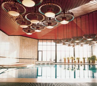 <font size="1">The Villa Auska was built for Leonid Brezhnev and completed two years before his death. Far from the usual seaside mildness, this colossus transposes into a Lithuanian glade the stiffness of a favorite Moscow style that young architects mockingly termed "cornice architecture." The seawater swimming pool is shaped like the cartographic outline of the Republic of Lithuania.<br /> Photo &copy; Fr&eacute;d&eacute;ric Chaubin</font>