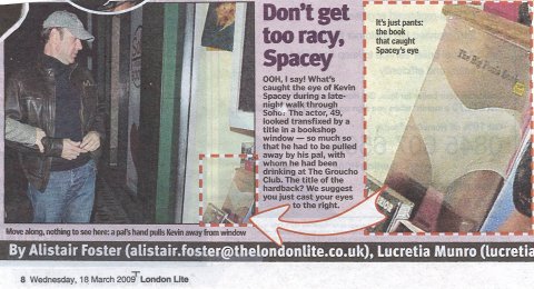 Kevin Spacey spots something interesting in Soho Book's window...